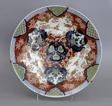 Appraisal: JAPANESE IMARI PORCELAIN CHARGER The cobalt-ground rondel with trefoil encircled