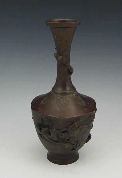 Appraisal: JAPANESE BRONZE BOTTLE VASE Each panel with the continuing scene