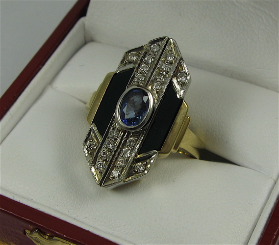 Appraisal: SAPPHIRE BLACK ONYX DIAMOND AND K GOLD RING centering an