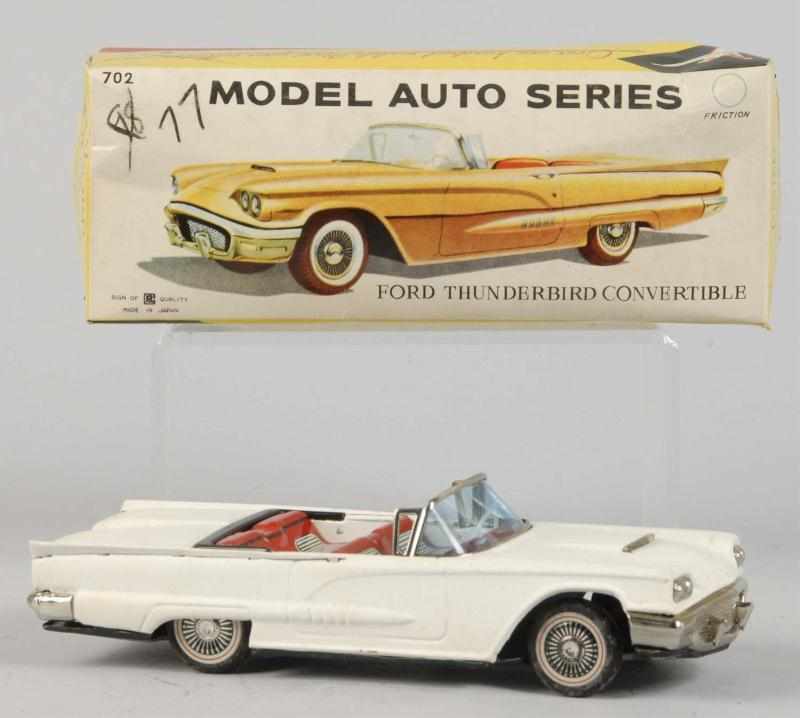 Appraisal: Tin Ford Thunderbird Convertible Friction Toy Description Japanese Working Made