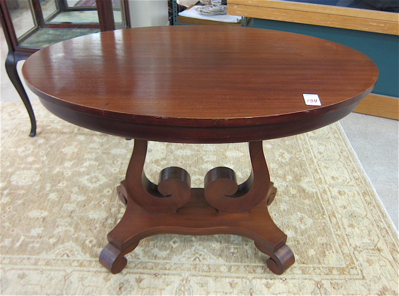 Appraisal: MAHOGANY EMPIRE REVIVAL CENTER TABLE American c having an oval