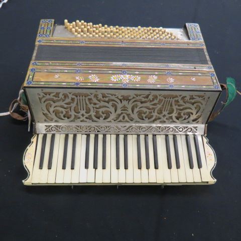 Appraisal: Antique Accordian elaborate original case