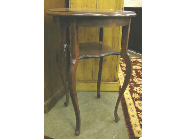 Appraisal: Vintage mahogany tiered round lamp table on cabriole legs with