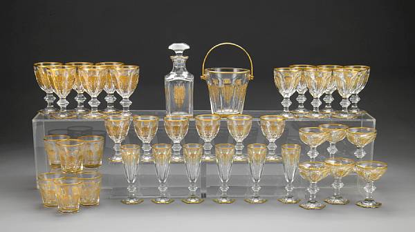 Appraisal: A suite of Baccarat gilt heightened glassware in the Empire