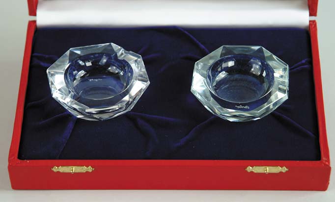 Appraisal: CASED PAIR OF CRYSTAL ASHTRAYS BY CARTIER Cut glass octagon