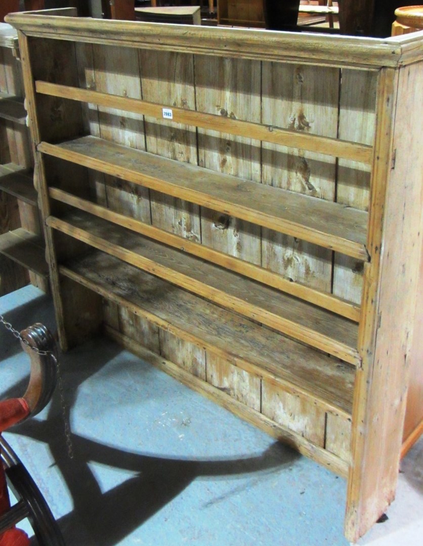 Appraisal: A pine dresser rack