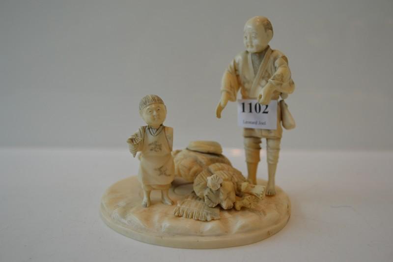 Appraisal: SIGNED JAPANESE IVORY OKIMONO FATHER AND SON WOOD CUTTER BOY