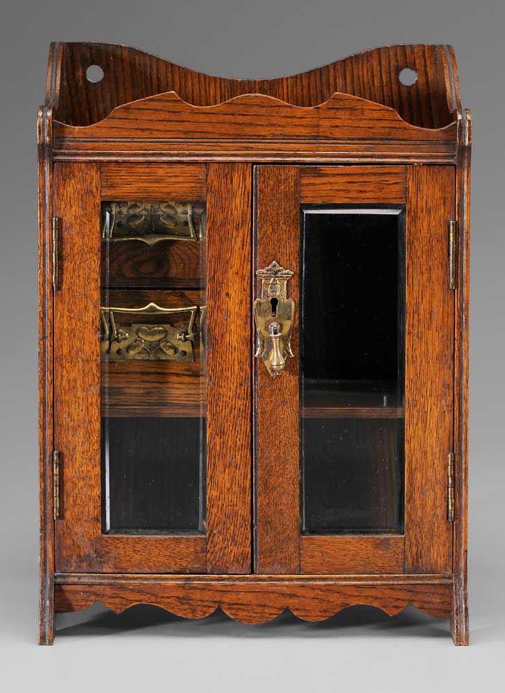 Appraisal: Gentleman's Oak Smoking Cabinet British early th century Art Nouveau