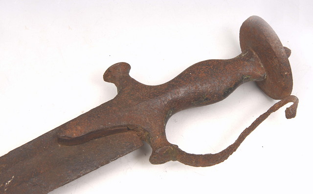 Appraisal: AN INDIAN STEEL TALWAR HANDLE with later straight blade