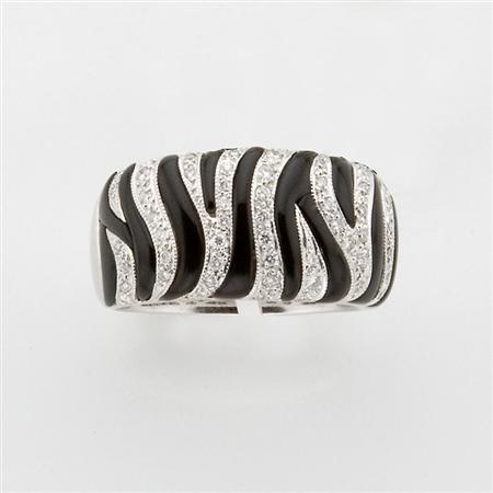 Appraisal: Diamond and Black Onyx Zebra Band Ring Estimate -