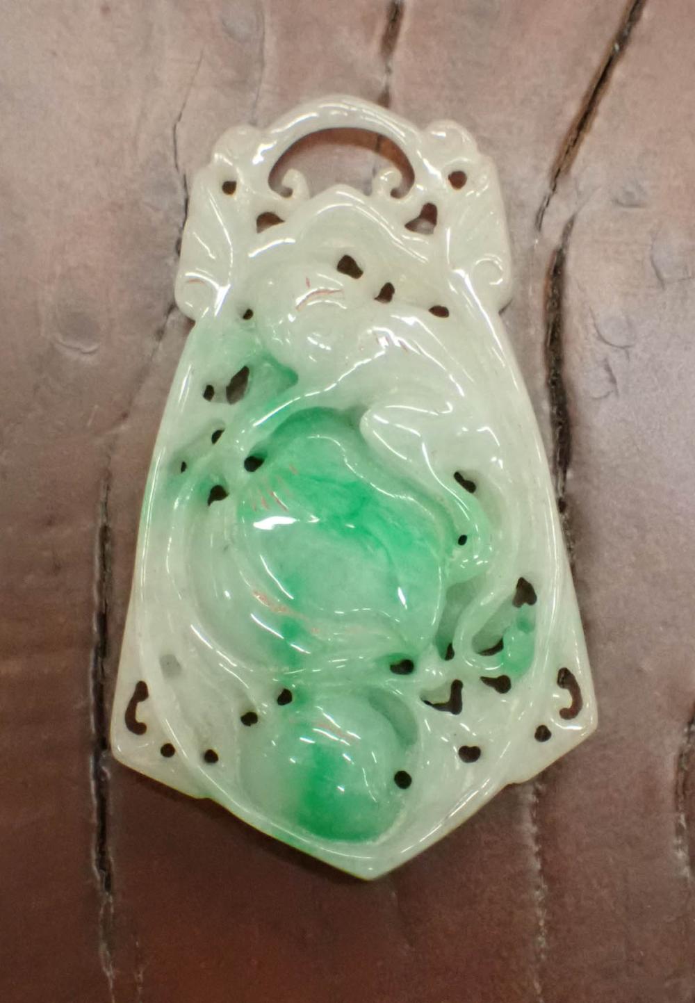 Appraisal: CHINESE CARVED JADE PENDANT monkey and peaches motif in mixed