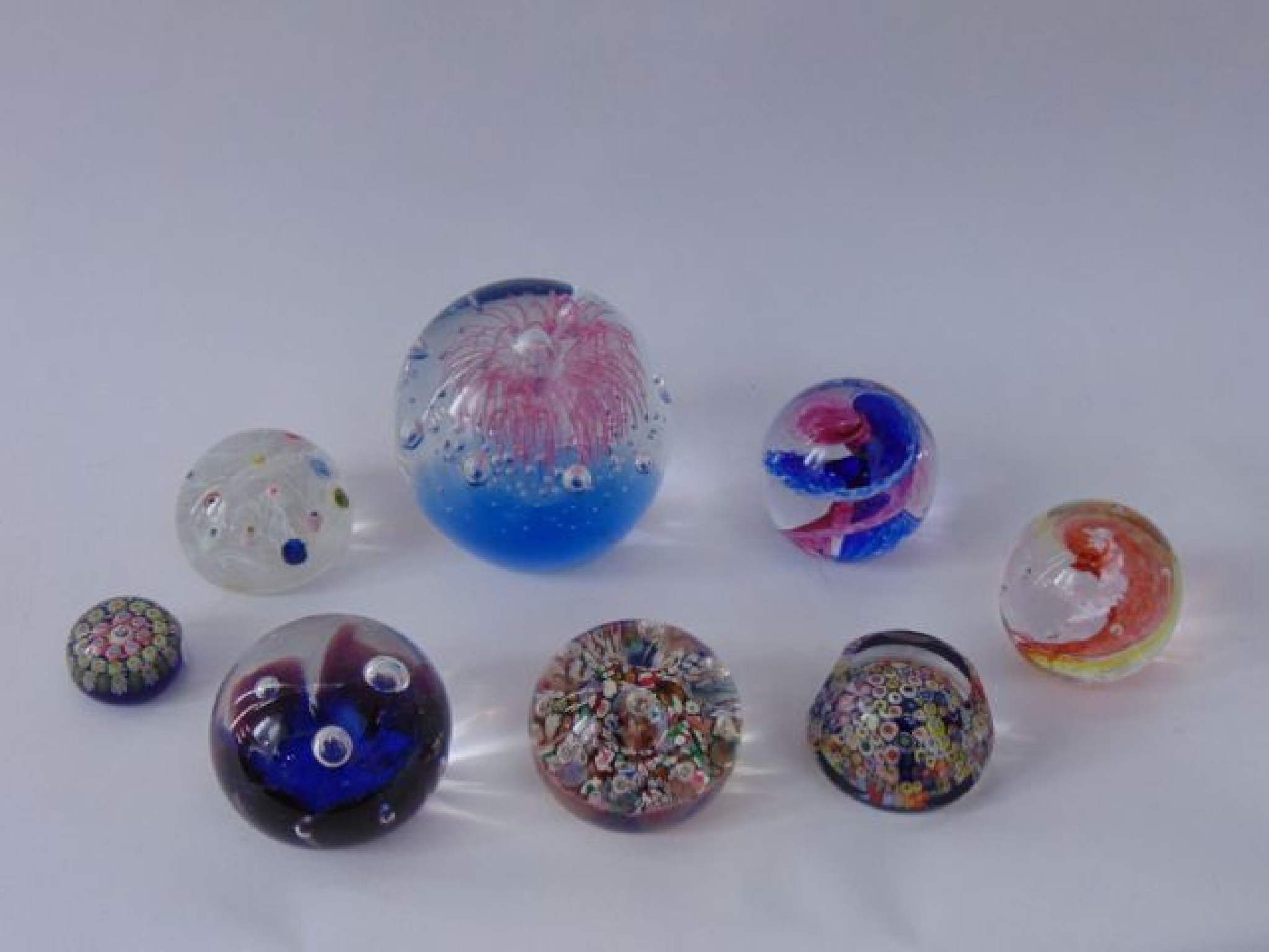 Appraisal: A collection of glass paperweights including Strathearn examples one with