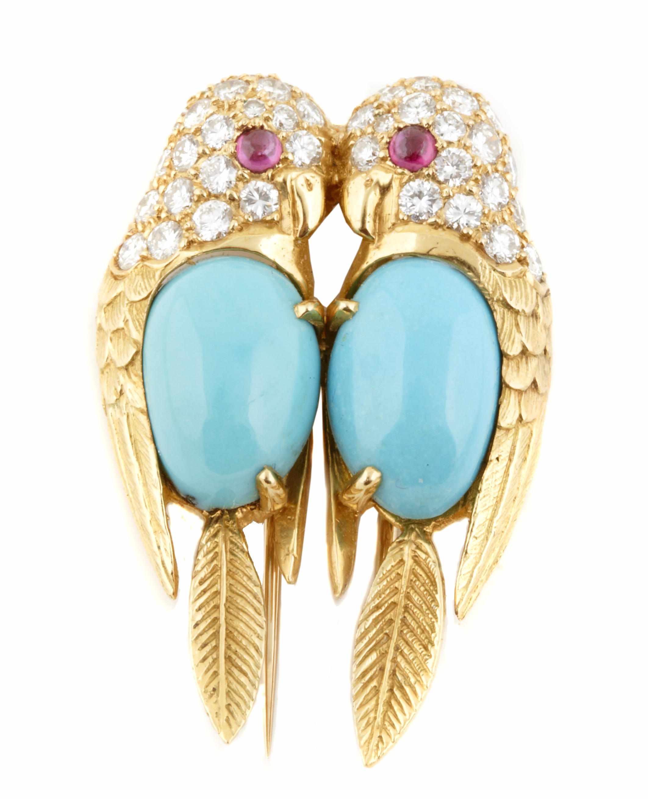 Appraisal: A diamond turquoise and gold love bird brooch