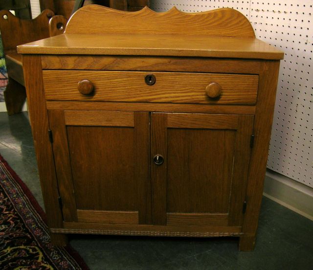 Appraisal: Country pine reproduction primitive wash stand