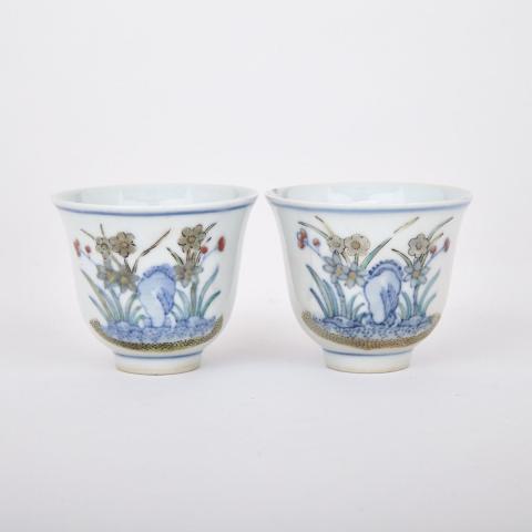 Appraisal: Pair of Doucai Floral Cups Xuantong Mark Each with thinly