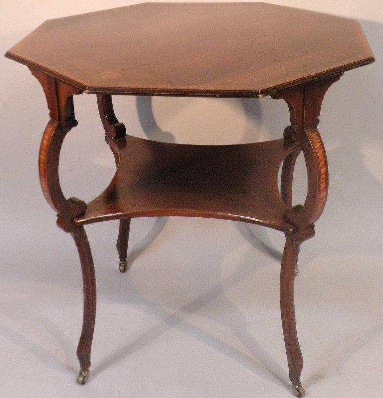 Appraisal: An Edwardian mahogany and boxwood strung occasional table the octagonal