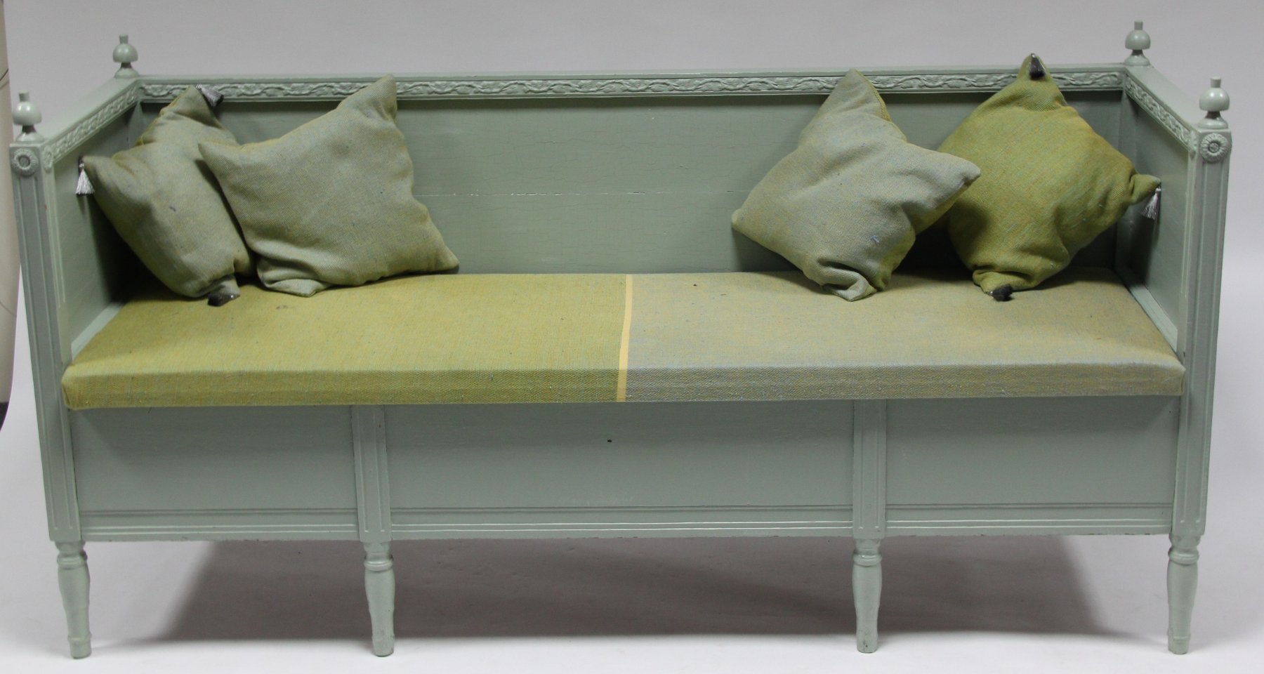 Appraisal: A Swedish painted sofa with upholstered seat enclosing a storage