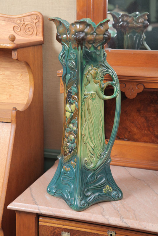 Appraisal: WELLER EWER Art Nouveau in green with a gowned lady