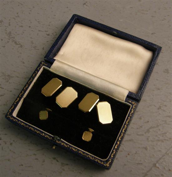 Appraisal: Pair of Gentleman's gold shaped rectangular cufflinks with engine turned