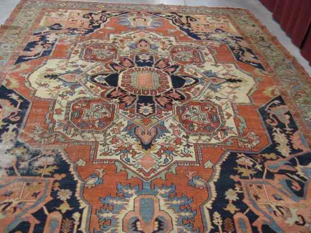 Appraisal: Heriz Persian Handmade Rug room size semi-antique grand central medallion