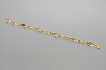 Appraisal: A Ladies' Gold Bracelet with Gemstones k yellow gold open-link