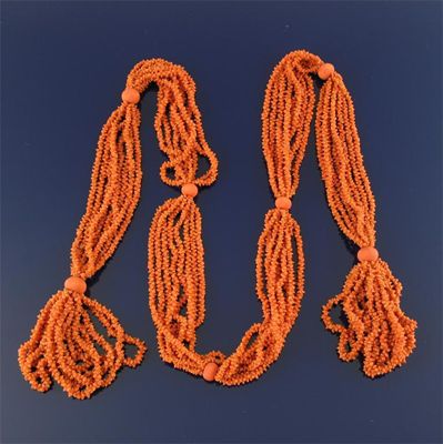 Appraisal: A th century multi row coral necklace with seven carved