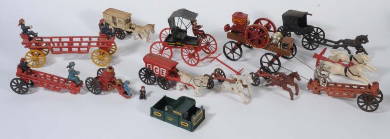 Appraisal: Large Lot of Cast Iron Horses Wagons Includes eleven wagons