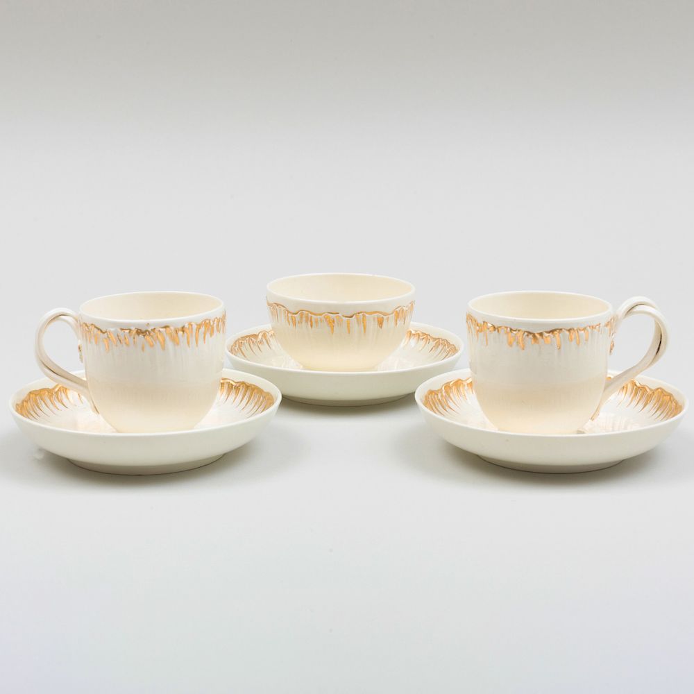 Appraisal: Pair of Wedgwood Gilt-Decorated Creamware Cups and Saucers and a