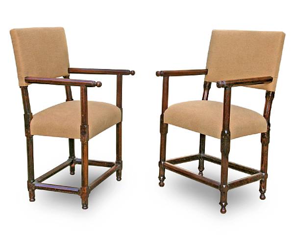 Appraisal: A near pair of Italian late Renaissance walnut armchairs Each