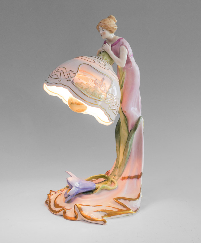 Appraisal: GERMAN PORCELAIN LITHOPANE LAMP Porcelain figure of a girl standing