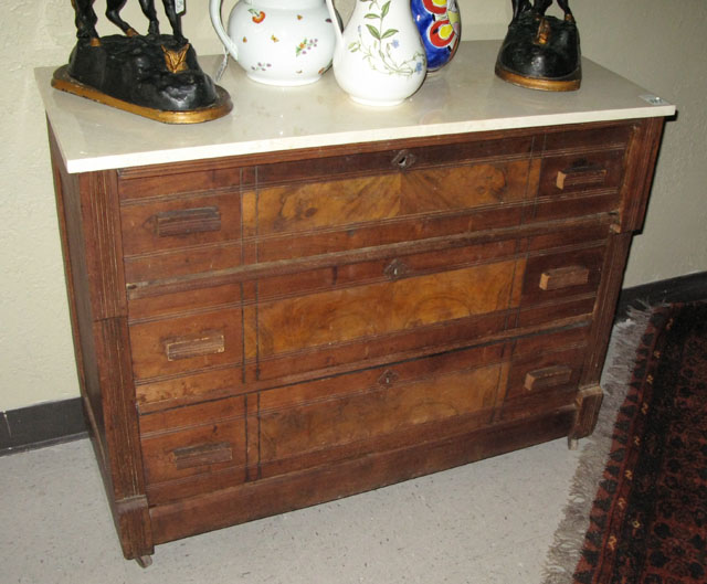 Appraisal: VICTORIAN WALNUT CHEST OF DRAWERS American last quarter of the