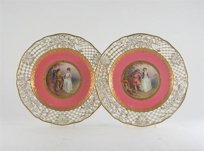 Appraisal: A pair of Minton plates with reticulated borders of flowers