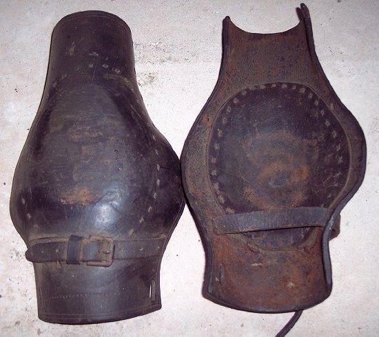 Appraisal: A pair of leather bell mufflers