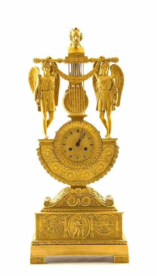 Appraisal: French Empire ormolu allegorical figural group lyre mantel clock circa