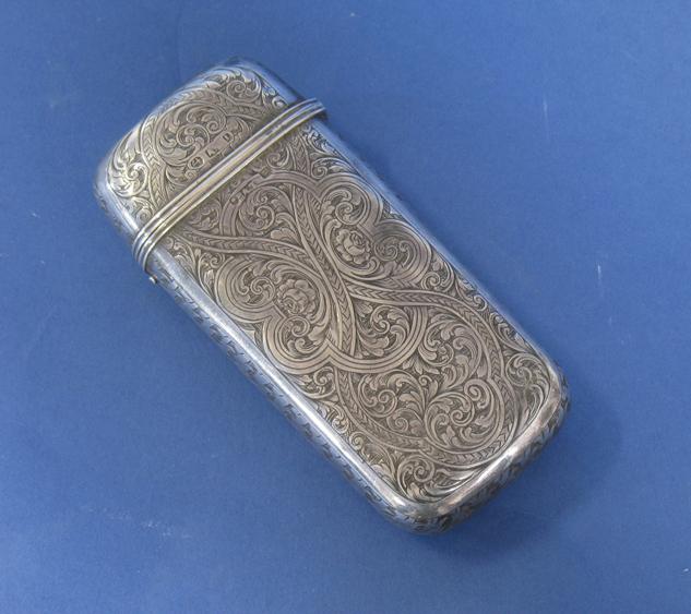 Appraisal: A VICTORIAN ETUI CASE of shaped rectangular form the body