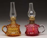 Appraisal: PAIR OF HONEYCOMB PATTERN MINI FINGER LAMPS S - Amber