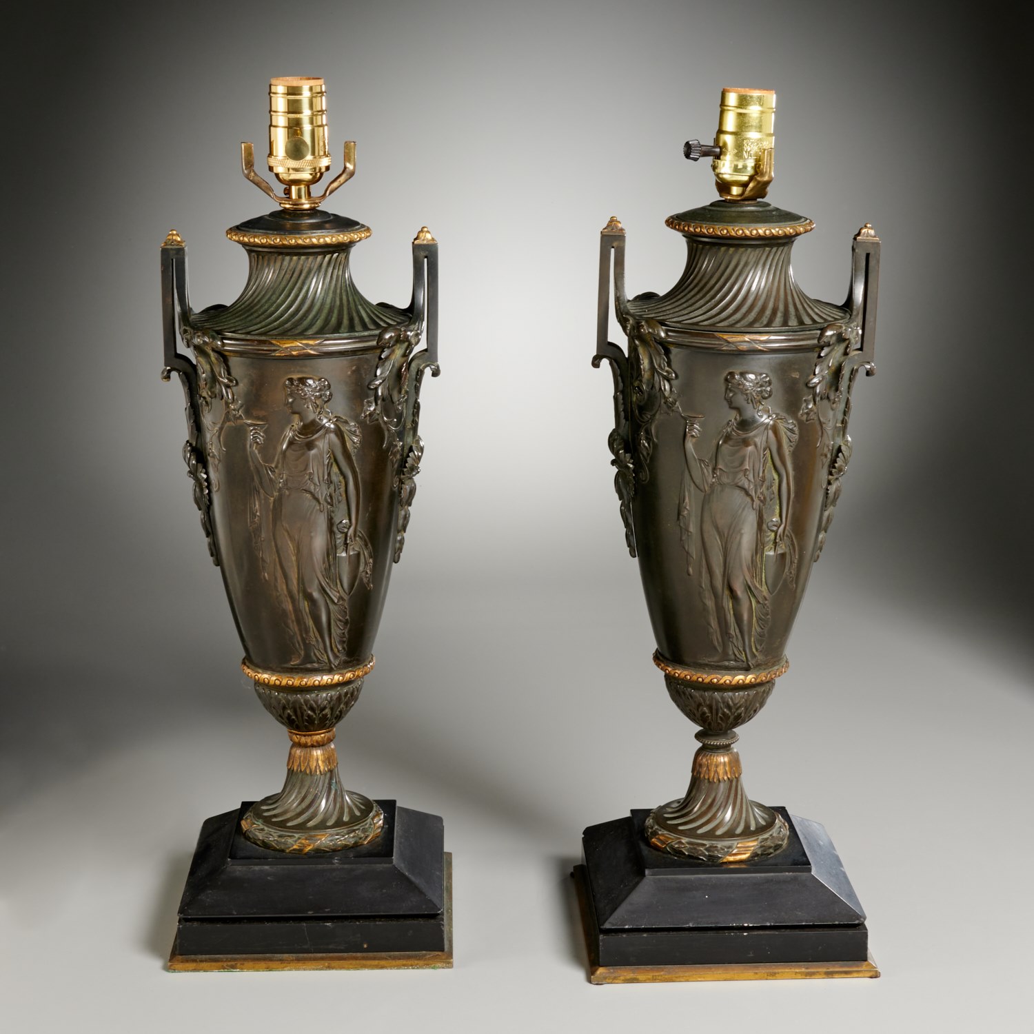 Appraisal: PAIR NAPOLEON III PATINATED BRONZE URN LAMPS th c manner