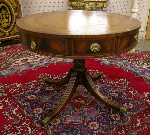 Appraisal: Mahogany Duncan Phyfe style pedestal drum table with tooled leather