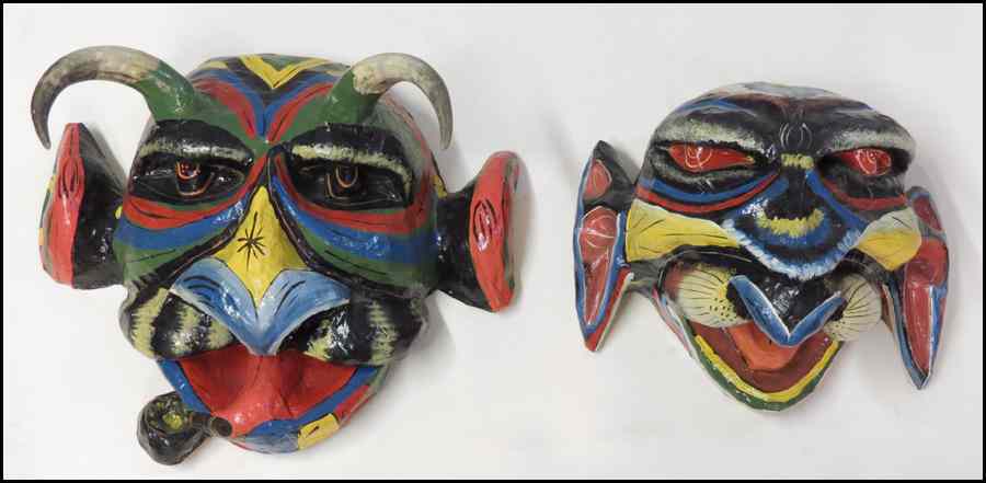 Appraisal: TWO HAITIAN PAPER MACHE CARNIVAL MASKS Largest '' x ''