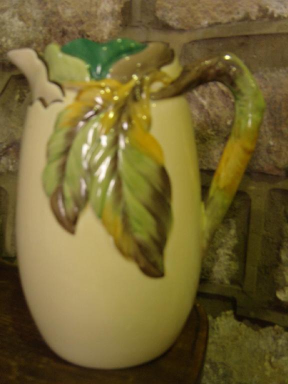 Appraisal: A large cream ground Newport pottery Clarice Cliff jug with