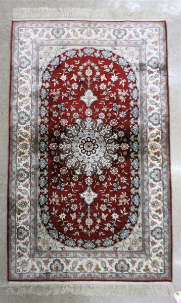 Appraisal: SILK INDO-PERSIAN AREA RUG floral and central floral medallion design