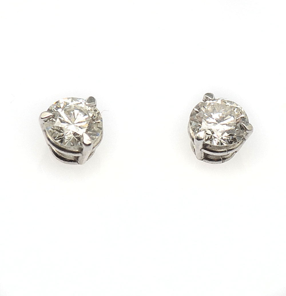 Appraisal: PLATINUM MARTINI STYLE CTW DIAMOND STUDS CTW are set martini