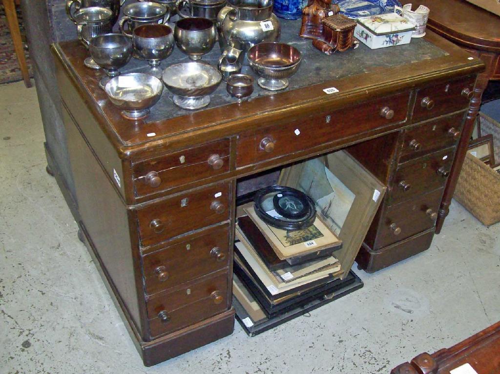 Appraisal: A Victorian walnut twin pedestal desk -