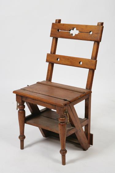 Appraisal: A VICTORIAN METAMORPHIC LIBRARY CHAIR the chair with a pierced