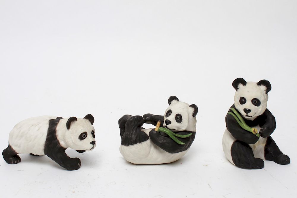 Appraisal: Boehm Porcelain Panda Bear Figurines Three Boehm porcelain bisque panda