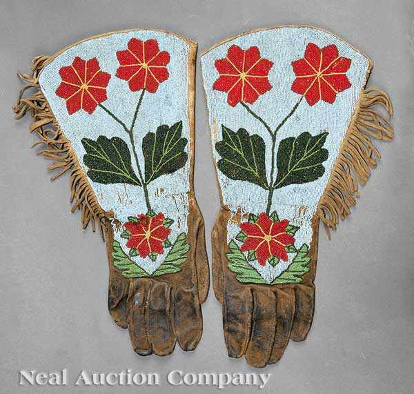 Appraisal: A Pair of Plateau Beaded Hide Gauntlets polychrome beads in