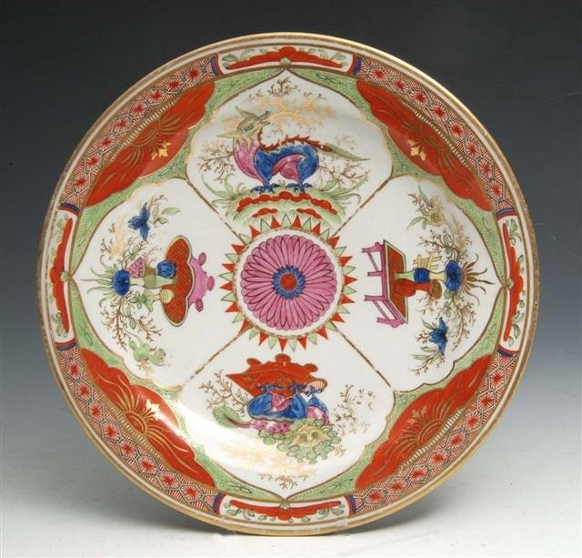 Appraisal: A CHAMBERLAINS WORCESTER PLATE painted in the 'Dragon in compartments'