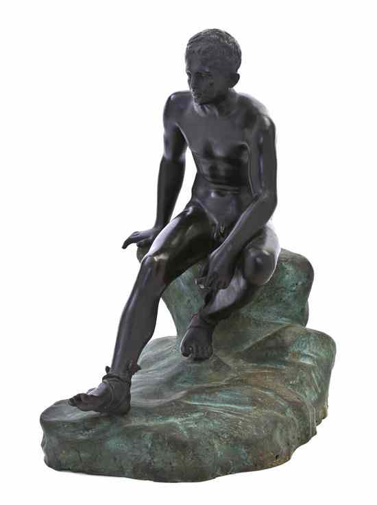 Appraisal: A Continental Bronzed and Patinated Metal Figure after the Antique