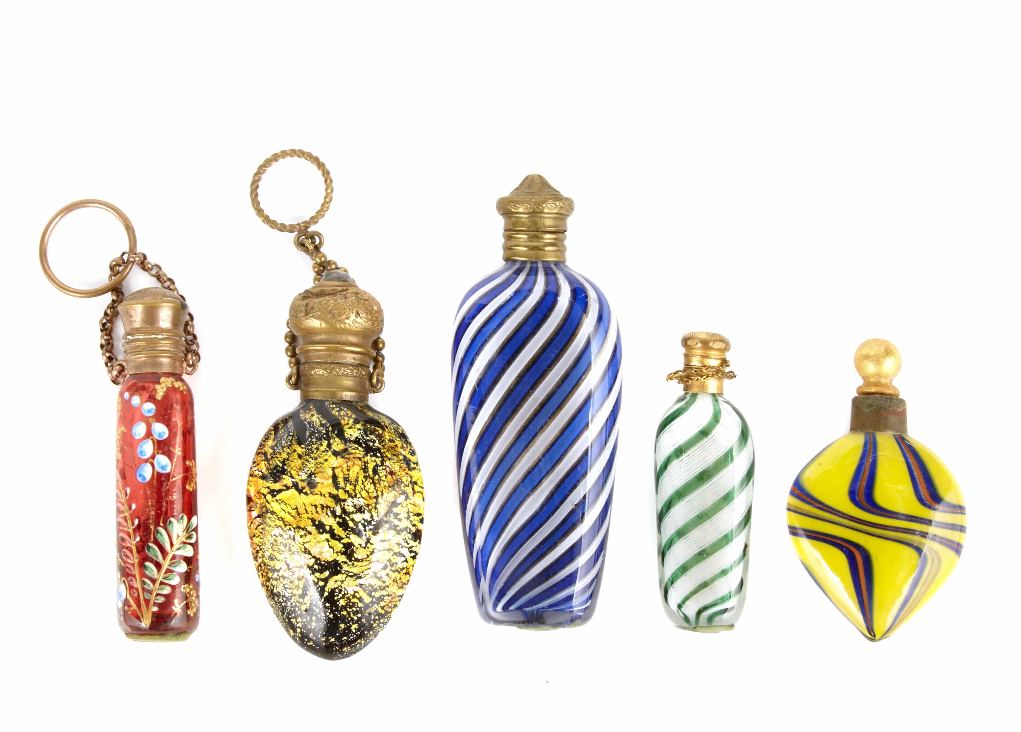 Appraisal: An assembled group of Continental glass scent bottles width of