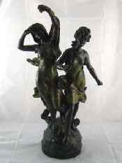 Appraisal: A large bronze of two girls strolling en deshabille a